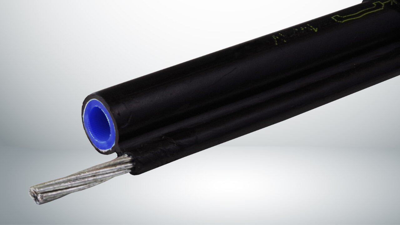 Black fiber cable with a blue inner duct and exposed metal strands.