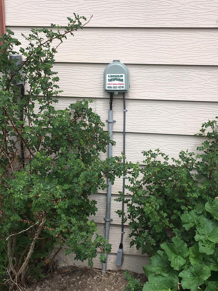 Image of Clearfield fiber product on side of residential house