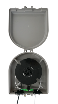 Curved CraftSmart Deploy Reel TAP enclosure open with reel.