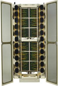 Front View of FieldSmart Fiber Crossover Distribution System (FxDS) Frame Kit With Doors Open & Spools Inserted