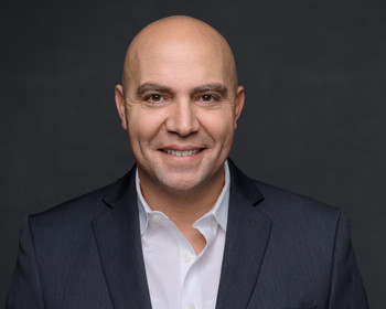 Portrait of a man in a suit.